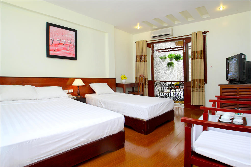 Nhi Trung Hotel Hoi An Pokoj fotografie